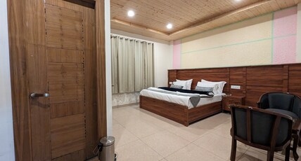 Hotel Mangalam by OXYGEN HOTELS Room Type - Deluxe Room (2-3 PAX)