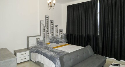 Al Alkeem Heights Room Type - King Studio with Sofa Bed