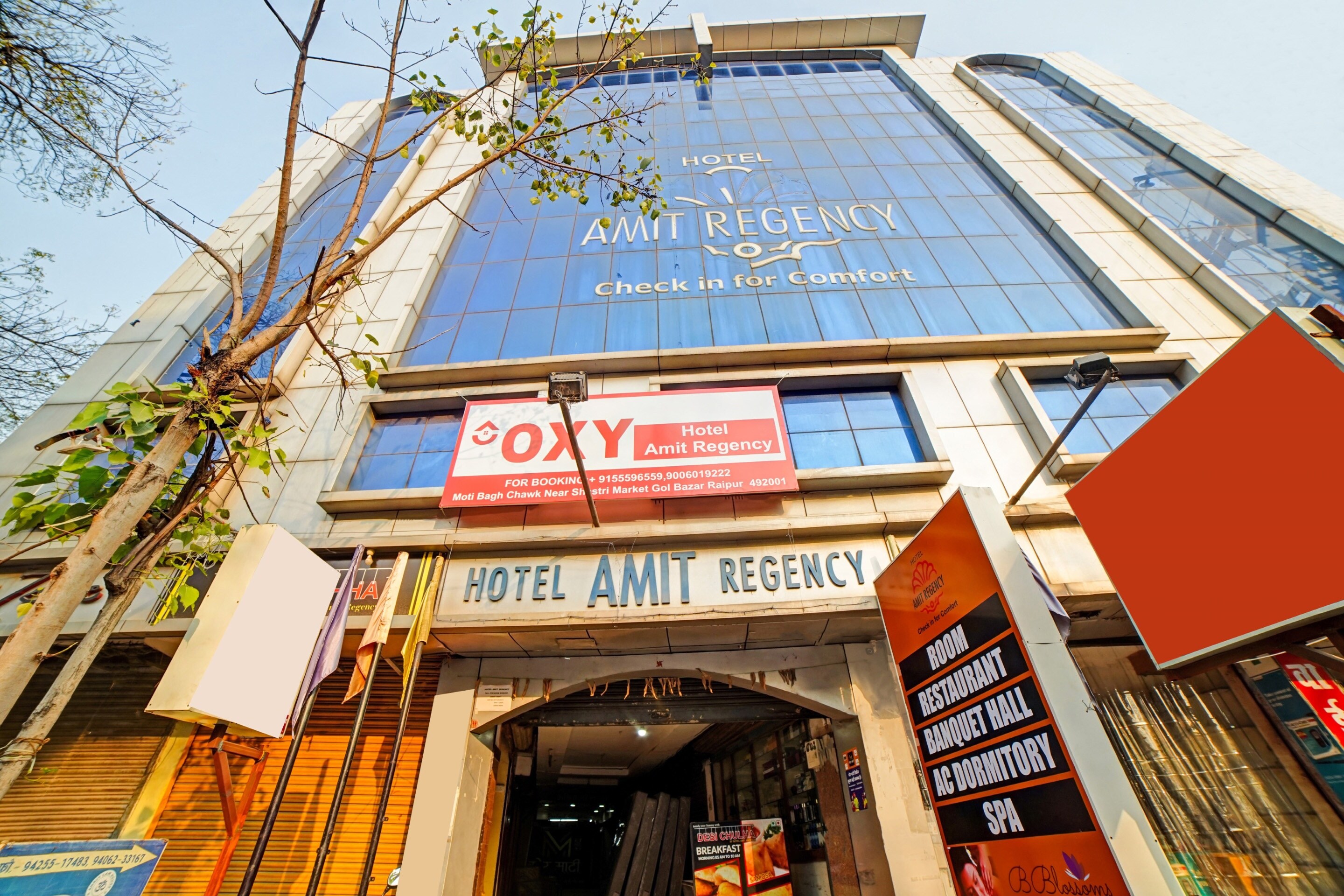 Capital O Convivial Hotel Amit Regency - Tap to explore photos