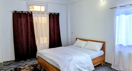Accomoon hotels Room Type - Double bed deluxe room with hills / terrace view