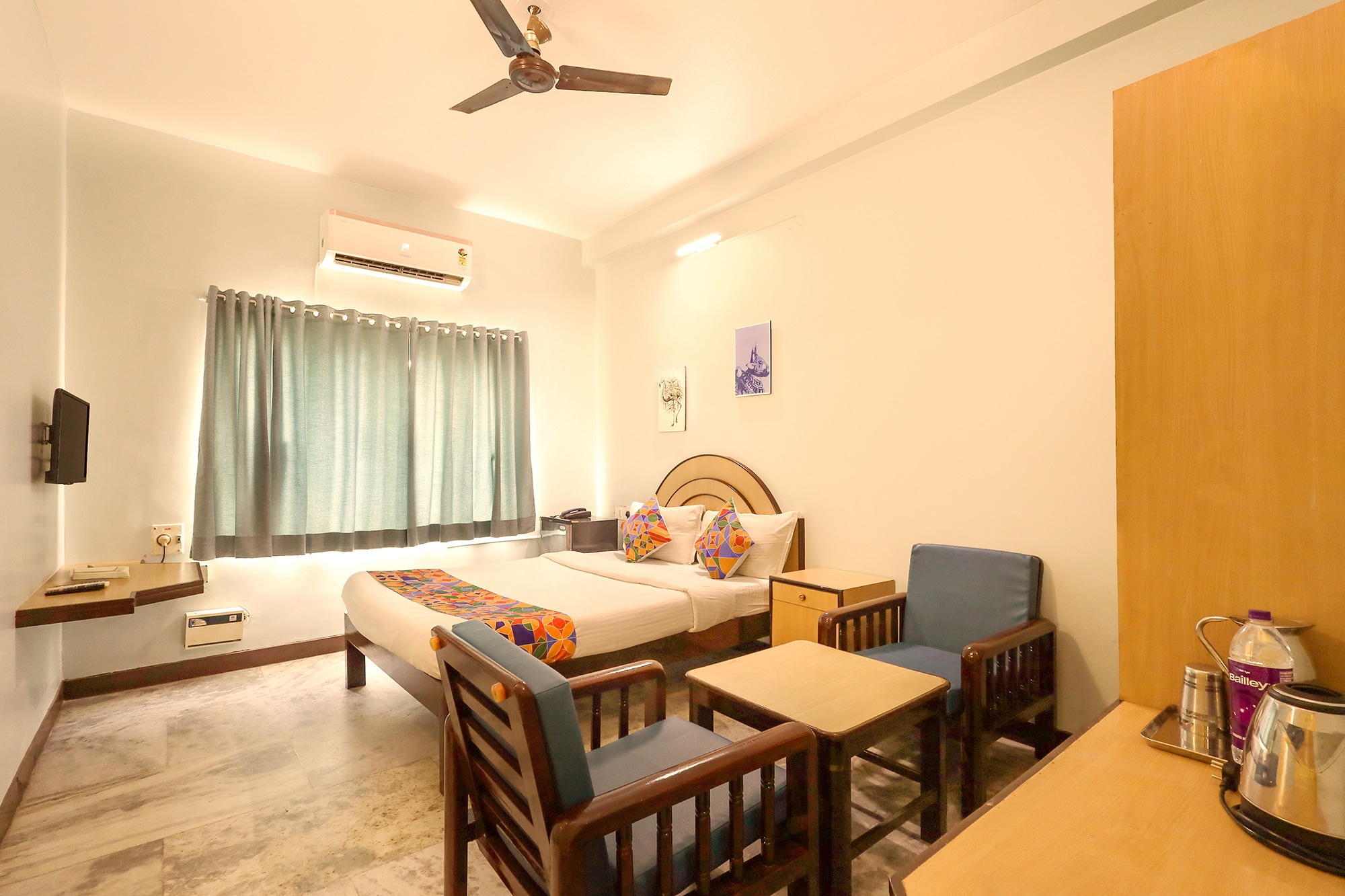 FabHotel Santhi Inn - Tap to explore photos