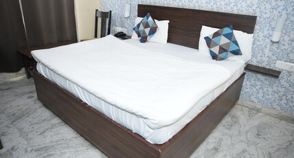 Hotel Lotus Prime Inn Room Type - Deluxe Room