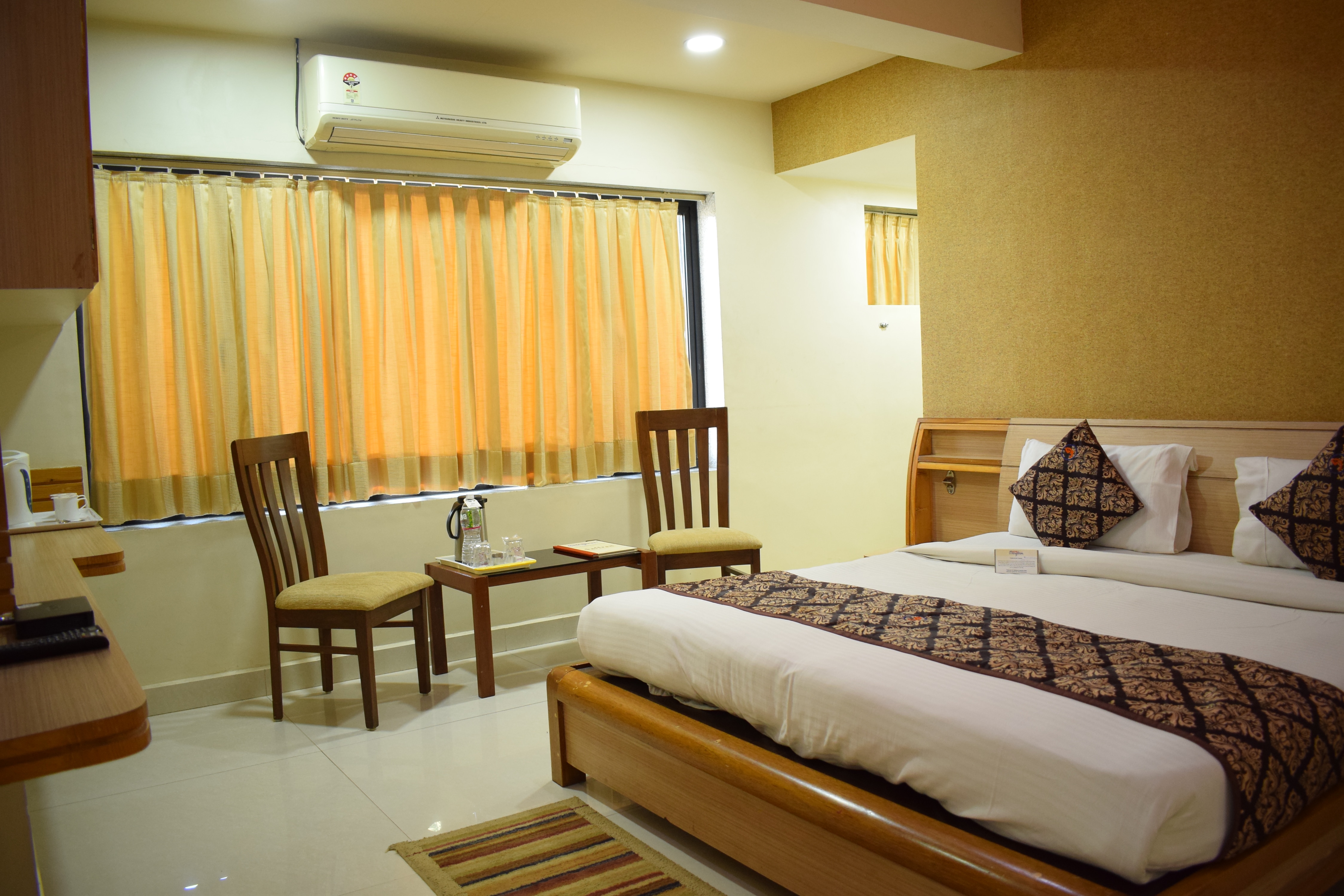 Hotel Mangalam - Tap to explore photos