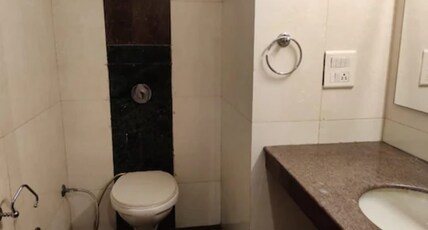 R S RESIDENCY Room Type - Deluxe Room