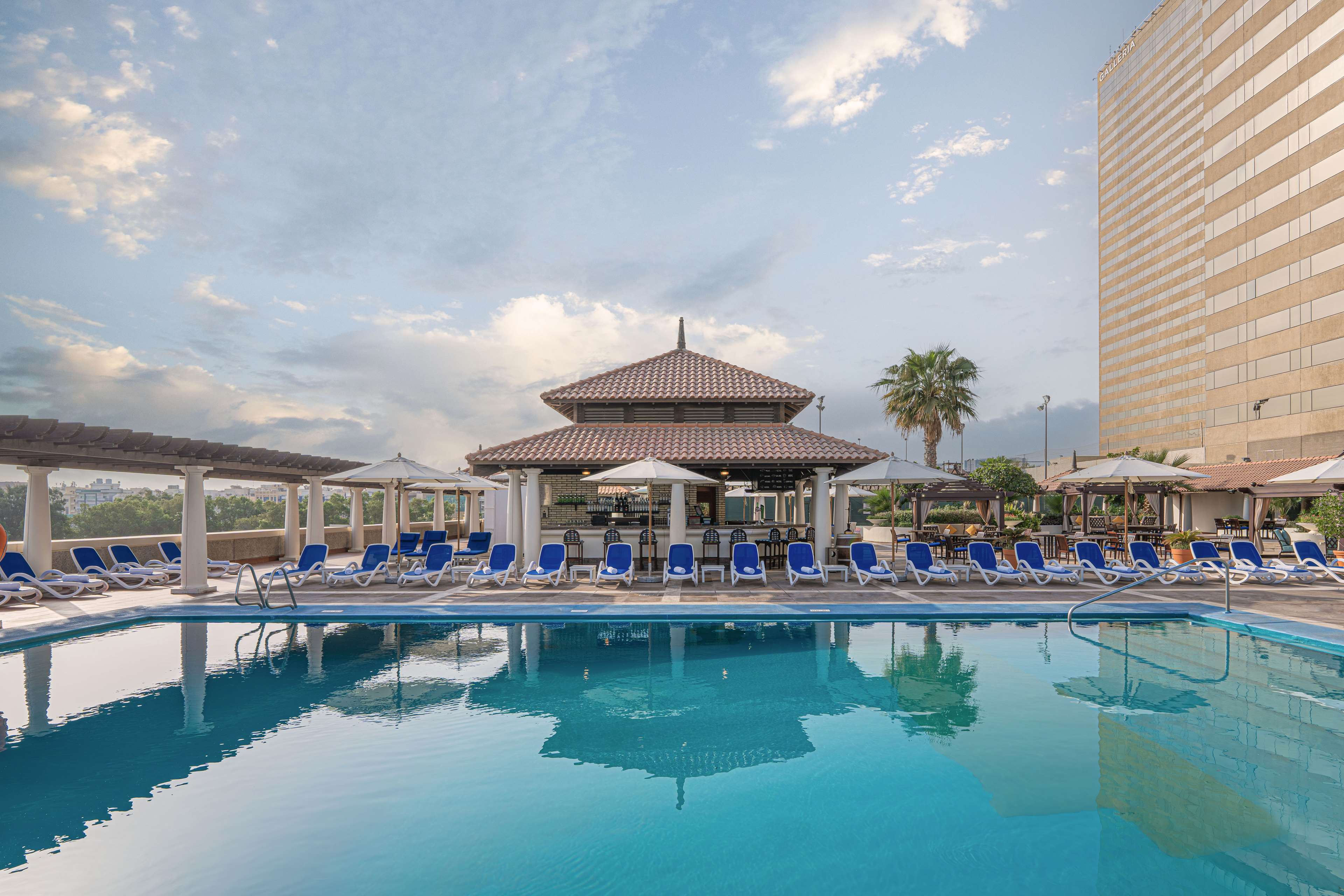 Hyatt Regency Dubai. - Tap to explore photos