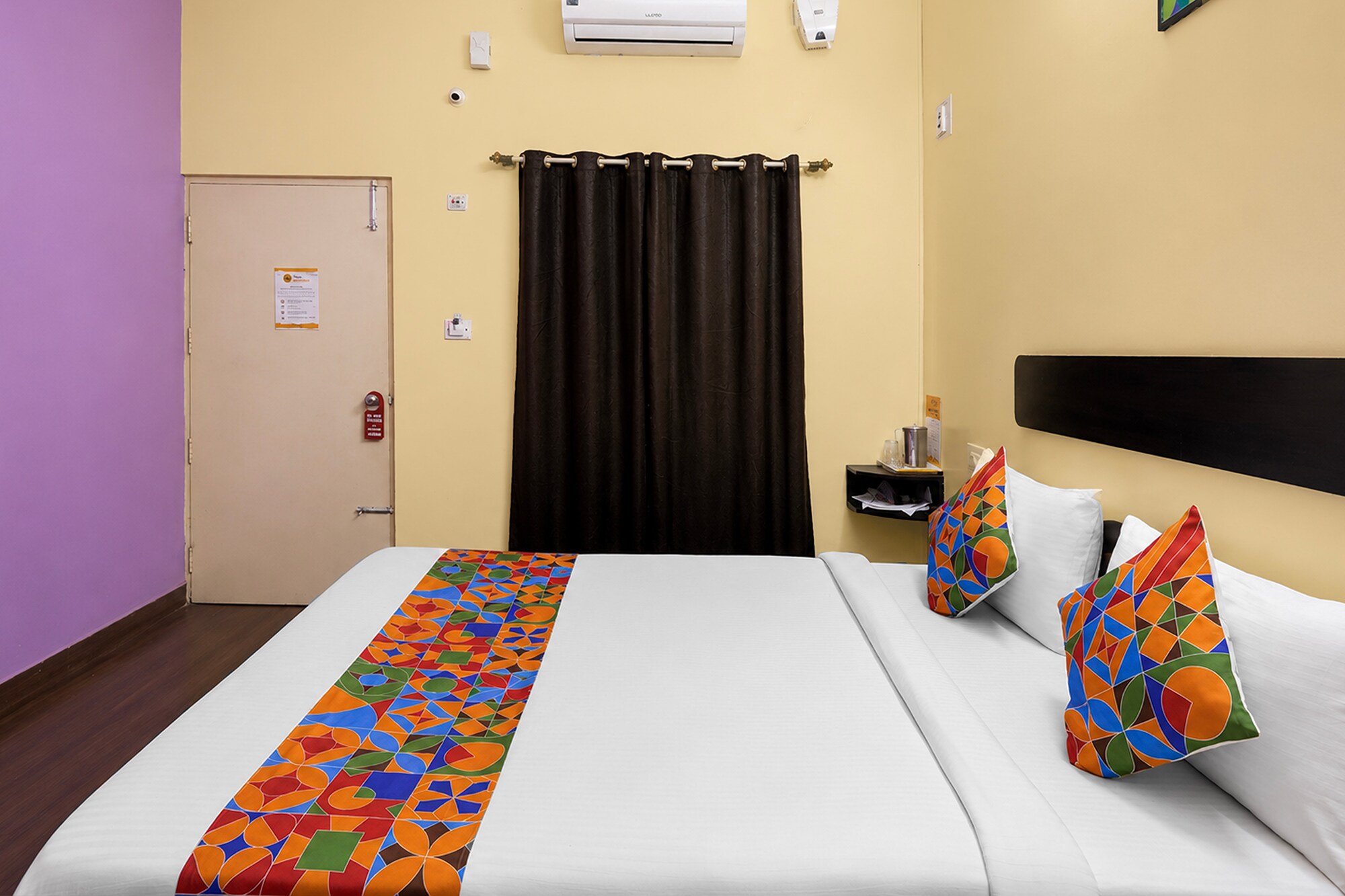 FabHotel Guru Comforts - Tap to explore photos