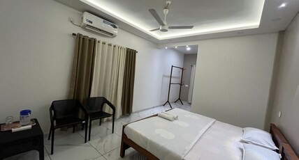 NAINAS RESIDENCY ALAPPUZHA Room Type - Bedroom 206
