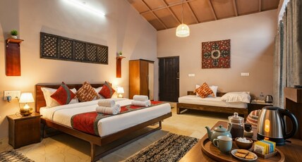 Nature's Vibe Stays luxury Villa with an orchard Room Type - Deluxe Triple Bedded Balcony Room