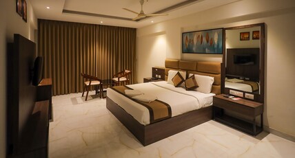 Adyar Plaza Inn by RAK Rooms, Mangaluru Room Type - DeluxeDouble AC Room