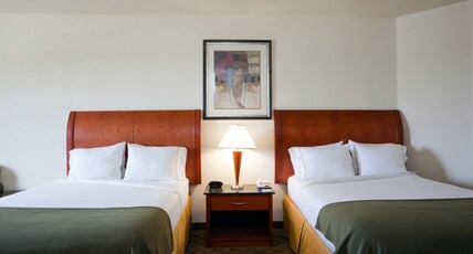 Holiday Inn Express Hotel & Suites Fairfield - North, an IHG Hotel Room Type - 2 Room 2 Queen Bed Suite with single Sofa separate bathrooms