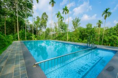 Wetlands Wayanad Pool Resort near Natural Waterfalls