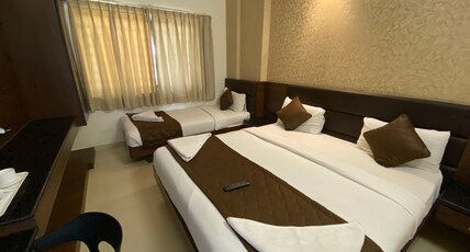 NITHYAA GRAND Room Type - Family Triple bed Room