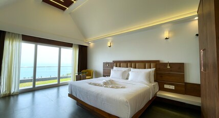 VENGA SEACLIFF RESORT Room Type - Sea view King Bed Room AC