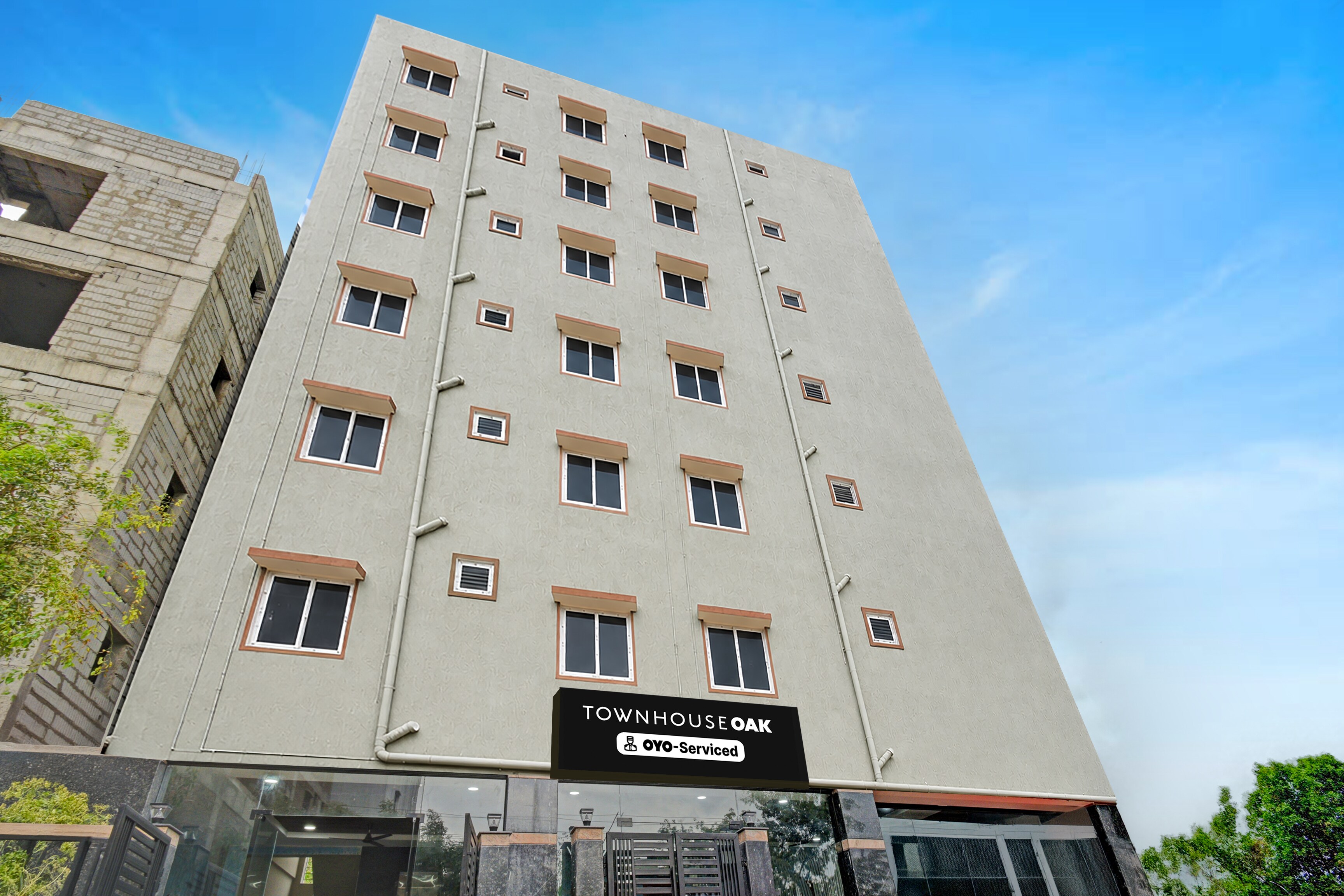 Super Townhouse Oak Hyderabad Central University - Tap to explore photos