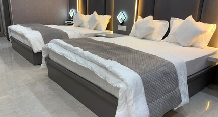 Hotel R J Heights Room Type - Deluxe Room with Free Wifi
