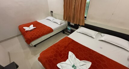 HOTEL TEMPLE SAI Room Type - Four Bed Non AC Family Room Near Sai Baba Temple