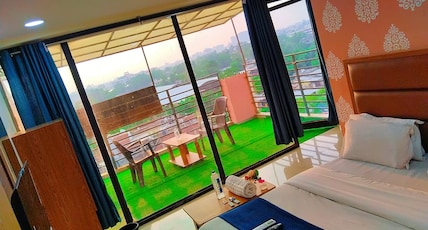 Hotel Sun Stay Ahmedabad Room Type - Deluxe Room with Balcony Hotel Sun Stay Ahmedabad Room Type - Deluxe Room with Balcony