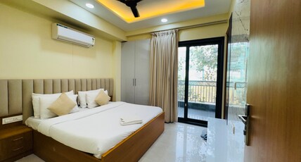 Akshay Premium 1 BHK Suites Near Artemis Hospital Room Type - Suite with Living Area kitchenette and Balcony
