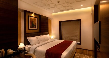 Hotel MBC Citadel Nashik Room Type - Deluxe Queen Room