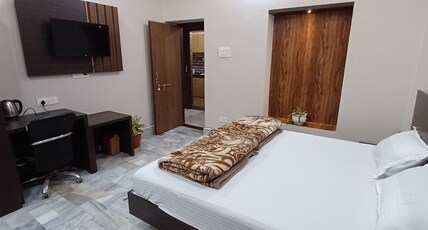 Mandakini Homestay Room Type - Deluxe Room with Attached Washroom