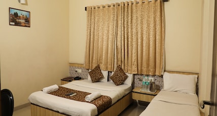 Hotel Sai Grand Castle Inn Room Type - Deluxe Triple AC Room Hotel Sai Grand Castle Inn Room Type - Deluxe Triple AC Room