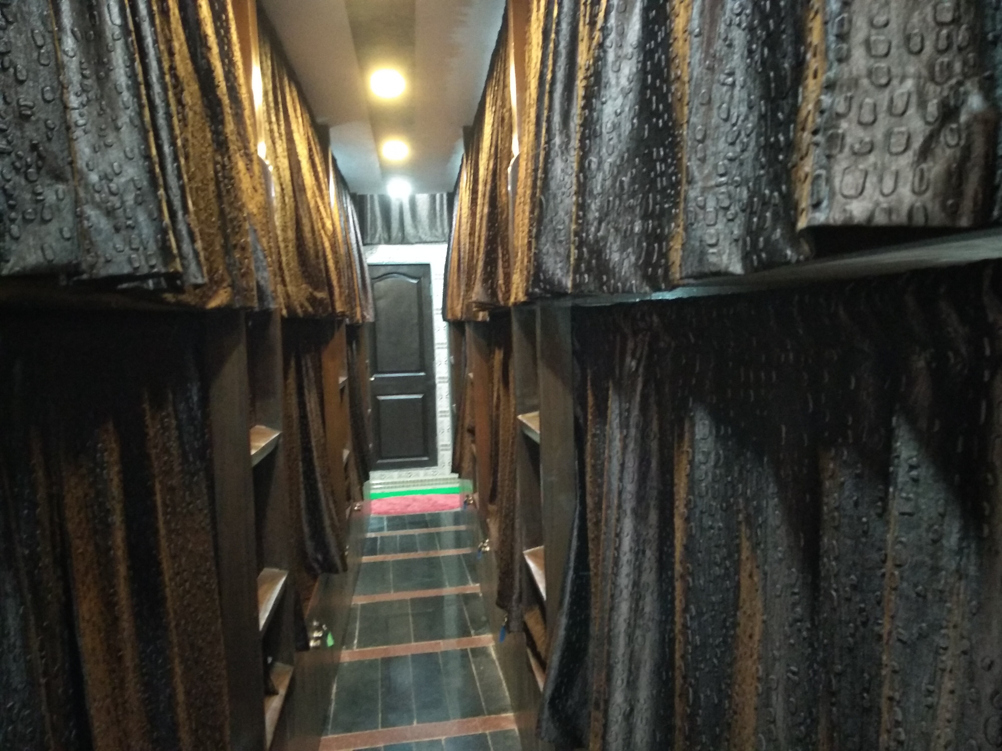 Bed Station Dormitory - Tap to explore photos