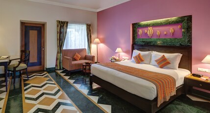 Ramada by Wyndham Udaipur Resort and Spa Room Type - Deluxe Room, Private Sitting Area, Garden View