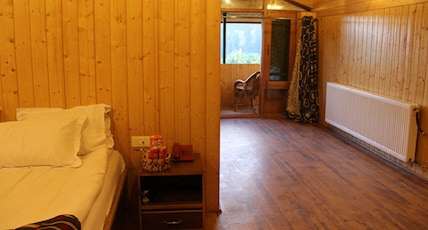 Hotel The Meadows - Gulmarg Room Type - Family Suite Room - Private Balcony (Centrally Heated) Hotel The Meadows - Gulmarg Room Type - Family Suite Room - Private Balcony (Centrally Heated)