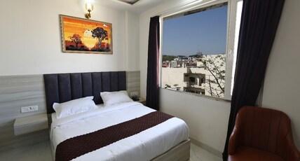 Hotel Finch Grand by Revaantra SS Hospitality Room Type - Premium Room