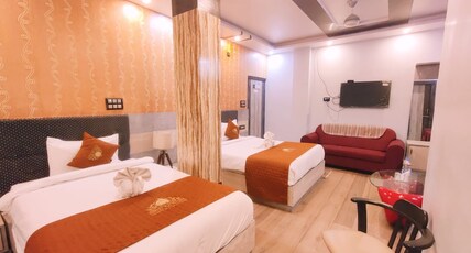 RAJ PALACE Room Type - Luxury Suit Room With Living Area ( Triple Bed ) RAJ PALACE Room Type - Luxury Suit Room With Living Area ( Triple Bed )