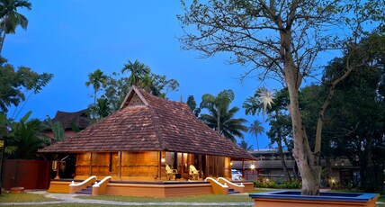 Illam Heritage | Traditional Kerala Woodhouse Room Type - Heritage Premium AC Room