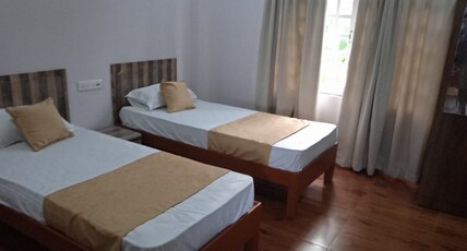 Mayong Villa,Marigaon Room Type - Deluxe Non AC