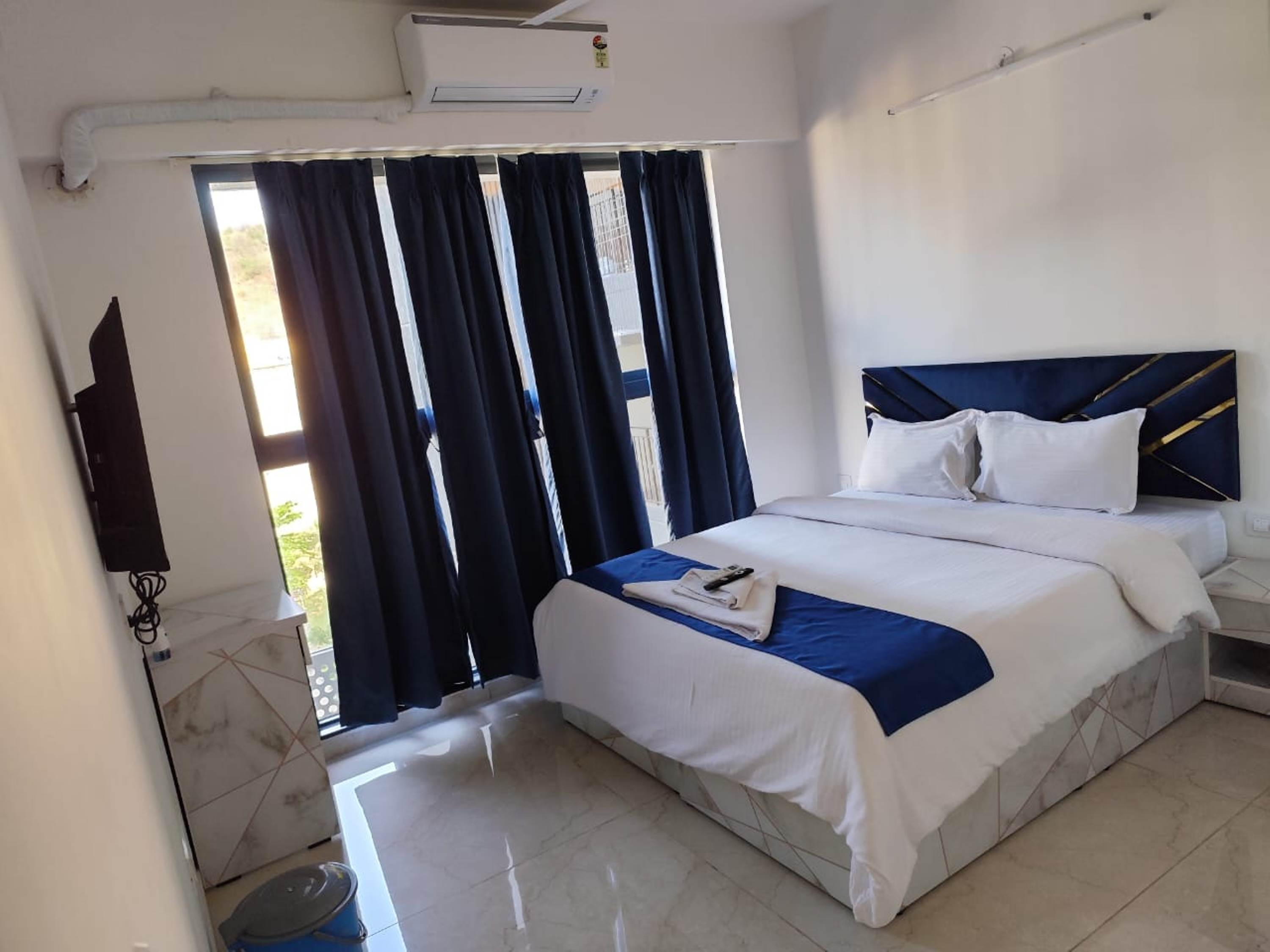 Uneek Home 2BHK Godrej Nahar - Tap to explore photos