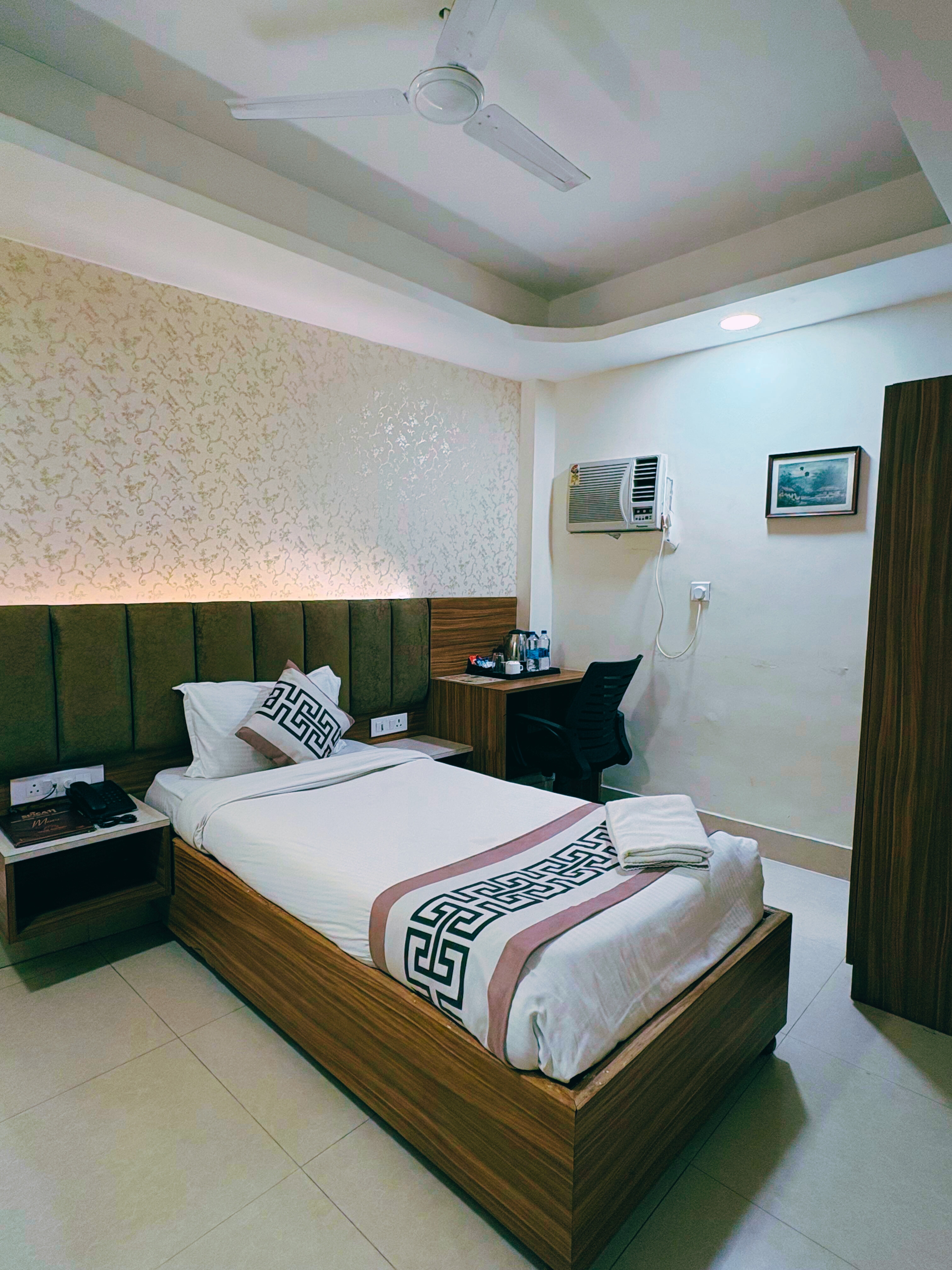 Hotel Santoor - Tap to explore photos