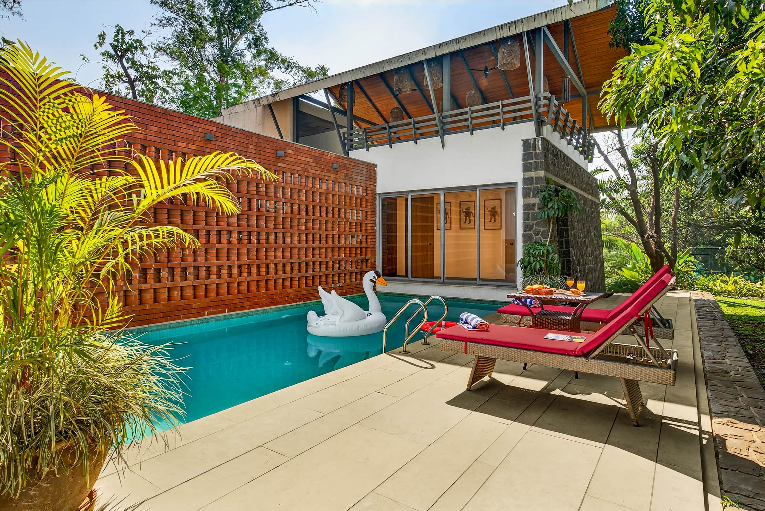 Stayscape Salt Water 4BHK Karjat Pvt Pool lawn - Tap to explore photos
