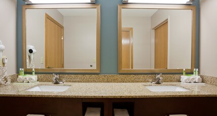Holiday Inn Express and Suites St. Cloud Room Type - 1 King 1 Queen 2 Bedroom Suite Sofa Bed