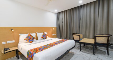 Fabhotel Unnam - Nr. Amazon Hyderabad Campus, Financial District, Gachibowli Room Type - Family Room