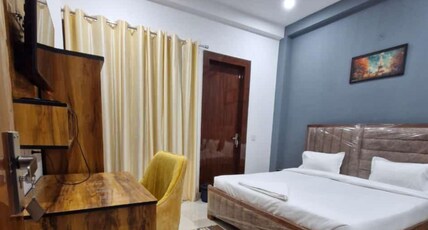 A One Corporate PG Rooms Room Type - Deluxe King Bed with Balcony