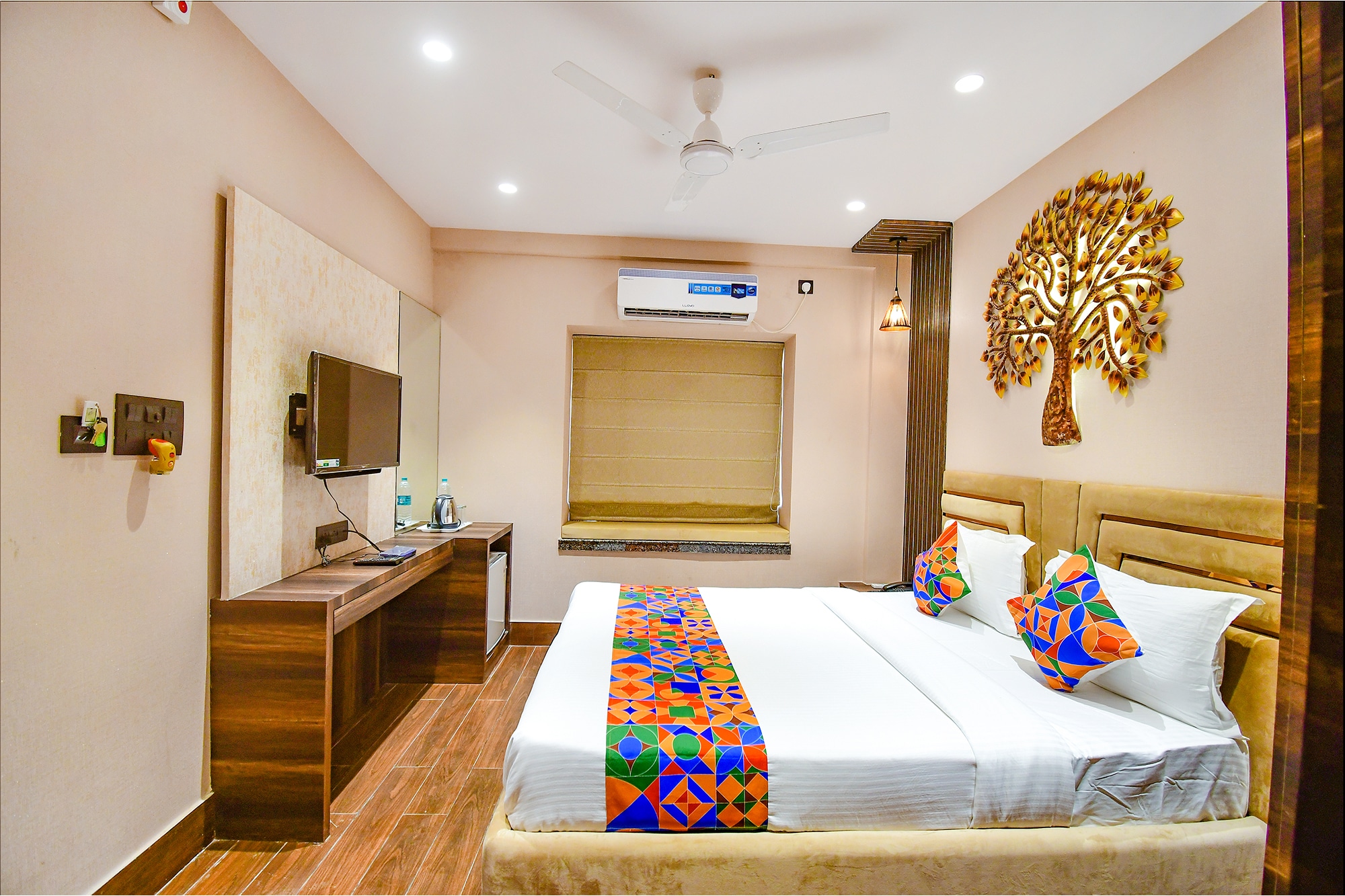 FabHotel Prime Jalsa - Nr. Axis Mall - Tap to explore photos