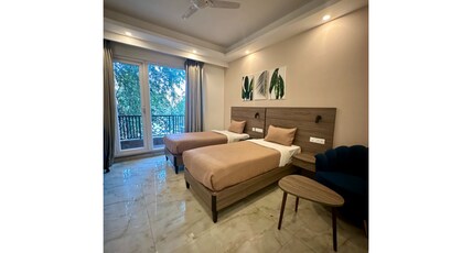 Flock Hotel I Golf Course Road Near Dlf Phase 1 Metro station I Gurugram Room Type - Premium Twin Room