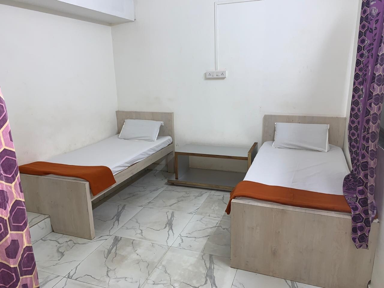 Sharma rest rooms - Tap to explore photos