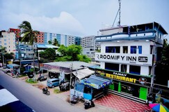 Roomify Inn | Near Trivandrum International Airport