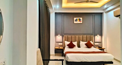 Hotel Mavens House - Near Artemis Hospital Room Type - Deluxe Room Hotel Mavens House - Near Artemis Hospital Room Type - Deluxe Room
