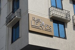 Raw Leaves  Premium Family & Business Hotel Near Rajkot Railway Station