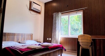 WoodsPicker Room Type - 205 Jungle view