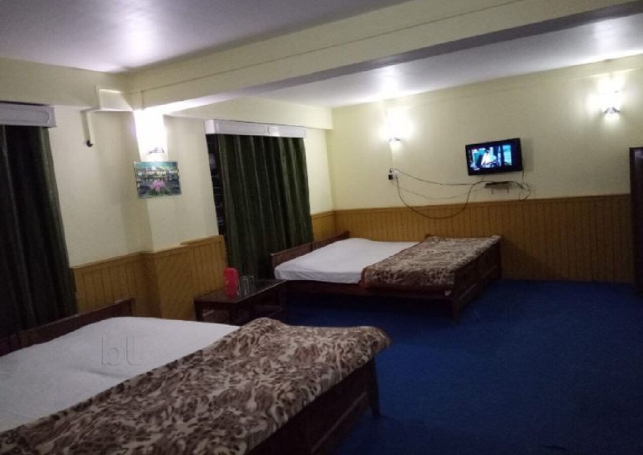 Hotel Kusum International - Tap to explore photos