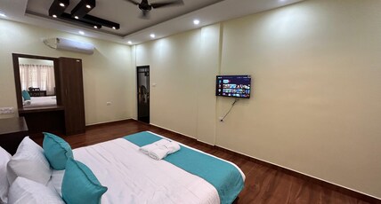 Athirapilly Inn Room Type - AC Deluxe Room