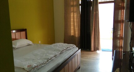THE OAK AND CEDAR HOTEL AND RESORTS Room Type - DELUXE DOUBLE BED ROOM