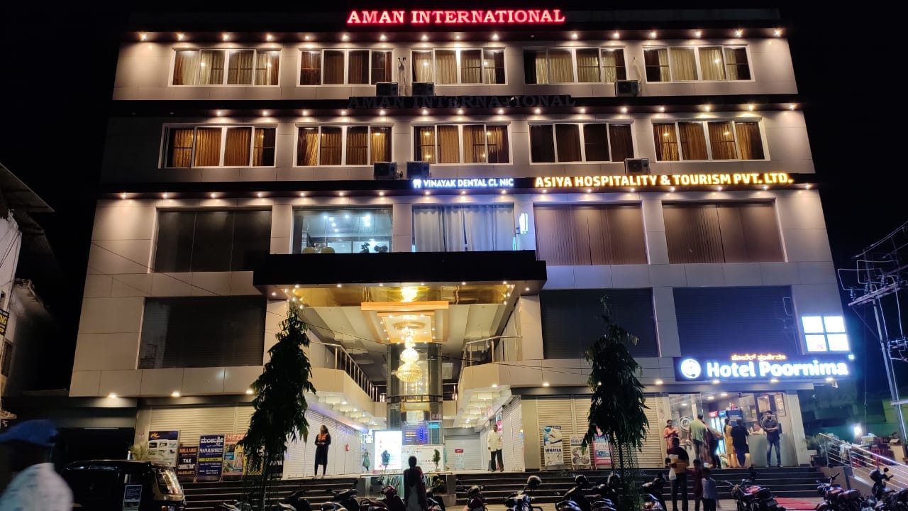 Aman International Hotel - Tap to explore photos