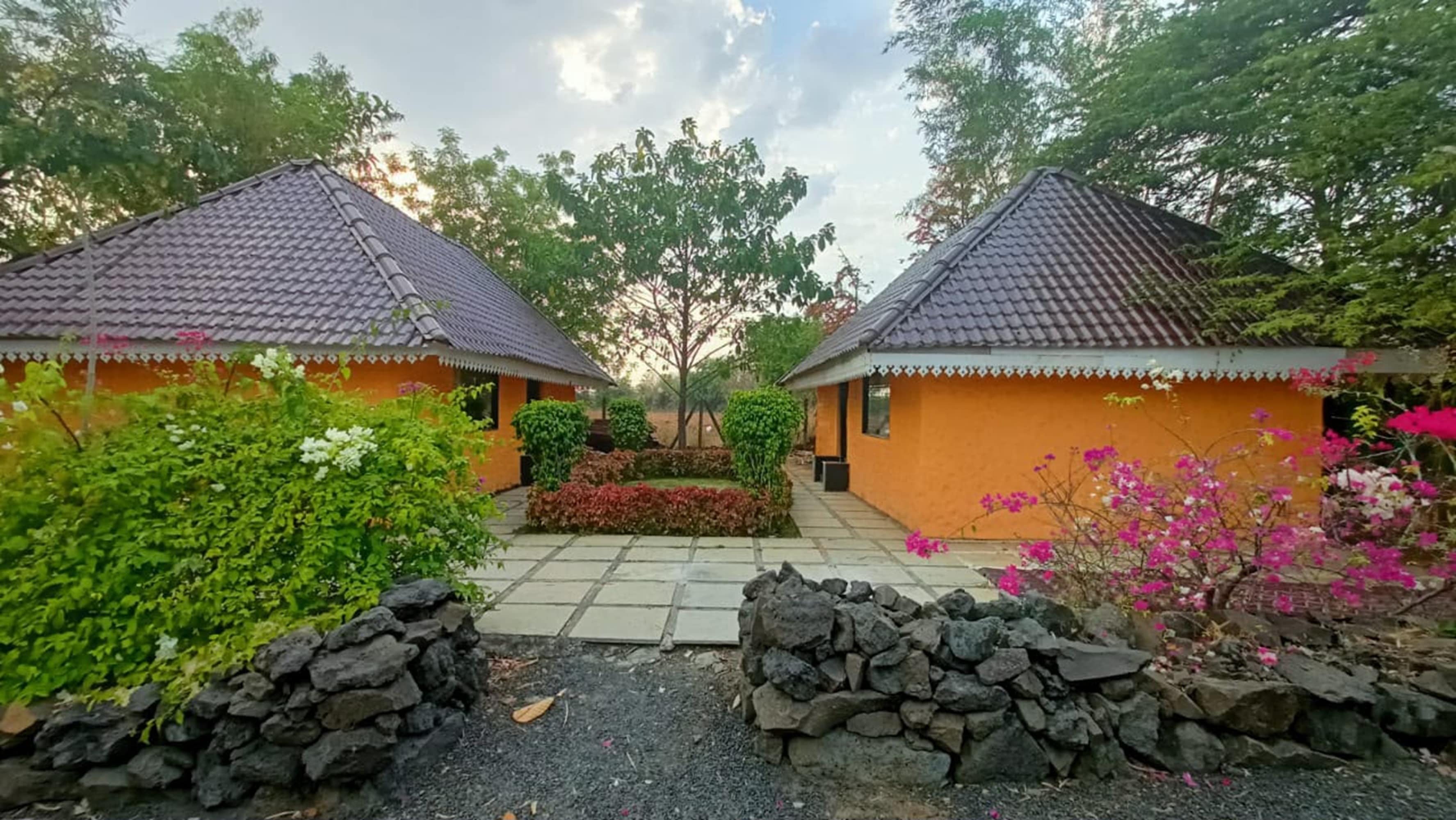 The Green Heaven Resort - Tap to explore photos